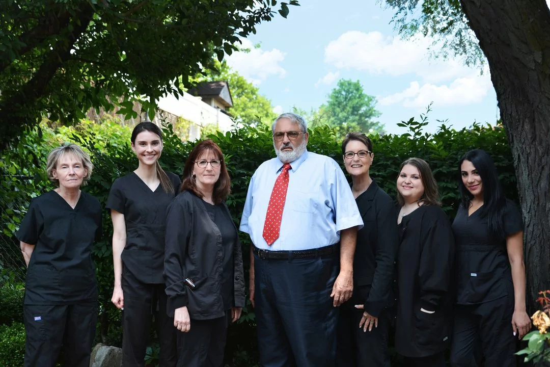 Group photo of dental staff and doctor at Staten Island Dental Care