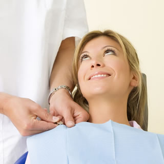 Woman in the dentists chair before a tooth extraction in Staten Island