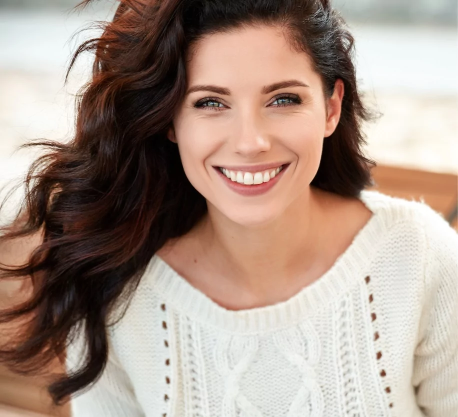 Smiling female cosmetic dentistry patient in Staten Island